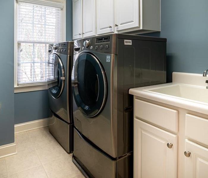laundry room showing washer and dryer